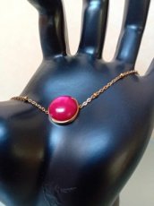 Armband rvs goud/cabochon rood