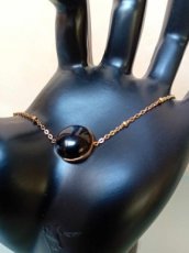 Armband rvs goud/cabochon zwart